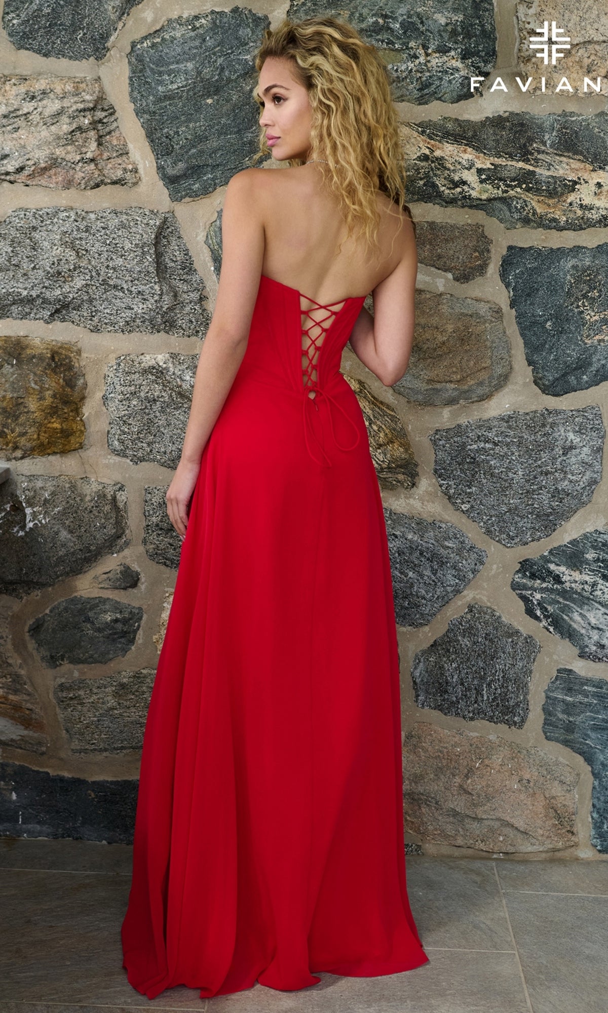 Faviana 11672: A strapless red floor-length corset prom dress with a lace-up back detail.