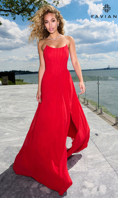 A woman wearing a Faviana 11672 floor-length red strapless corset prom dress with a bodice and a high slit.