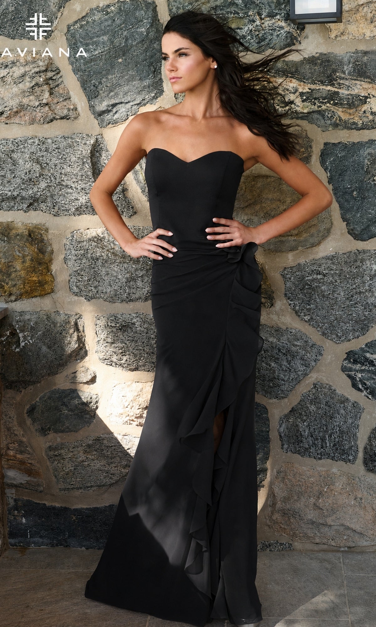 Long Prom Dress: Faviana 11673 in black, featuring a floor-length, strapless silhouette with a sweetheart neckline and a ruffled side slit.