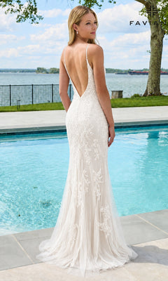 A woman wearing the Long Prom Dress: Faviana 11678, a floor-length, backless white gown with intricate beaded lace appliques, standing by a swimming pool.