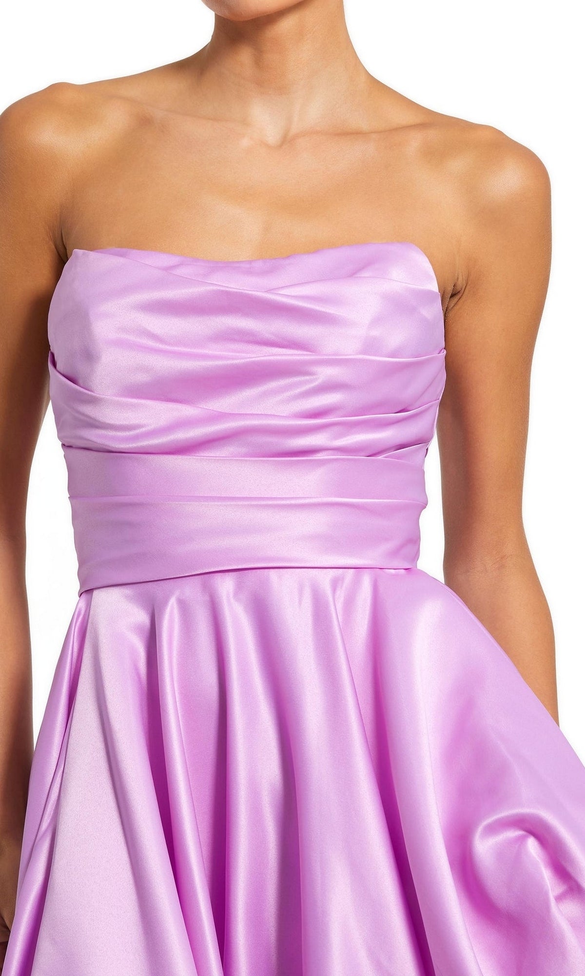 A woman wearing the Strapless Balloon Prom Dress by Mac Duggal 11685, featuring a fitted satin lilac design with a ruched bodice and flared skirt.