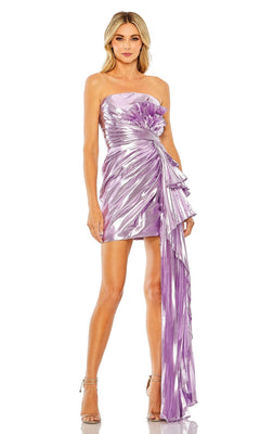 A woman wears the Mac Duggal Short Homecoming Dress 11695, a strapless lavender metallic ruched party dress with gathered details and a pleated side sash, styled with strappy high-heeled sandals.