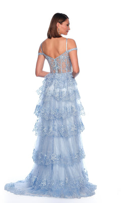 Woman wearing the Dave & Johnny 11713 Long Prom Dress, a light blue ruffle tiered A-line gown with off-the-shoulder straps and sheer lace corset, standing against a white background.
