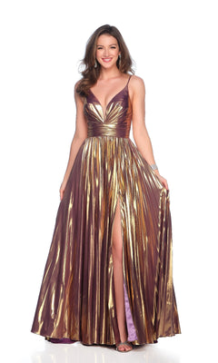 A woman stands smiling against a white background, wearing the Dave & Johnny 11741 long prom dress—a gold metallic A-line gown with purple accents, deep neckline, and high slit.