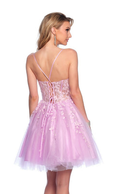 A woman is shown from behind in the Dave & Johnny 11750 Purple Homecoming Dress, featuring floral appliques, a lace-up corset bodice, and a flared tulle skirt.