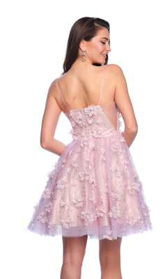 A woman shown from the back wears the Dave and Johnny Short Purple Hoco Dress 11751—a sleeveless A-line party dress with thin straps and floral appliqués.