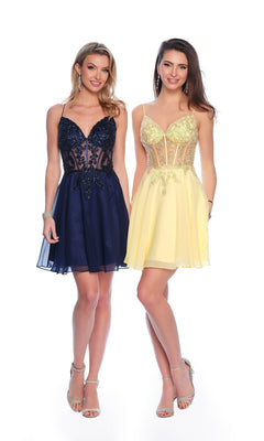 Two women stand side by side in chic dresses: one wears a navy lace cocktail dress, while the other sports the Dave & Johnny Short Chiffon Hoco Dress 11789 in yellow with embellishments, both paired with strappy heels.