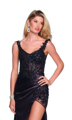 A woman in the Dave & Johnny 11822 long prom dress, navy blue with a sequin bodice and high slit, accessorized with drop earrings and a bracelet, stands against a plain white background.