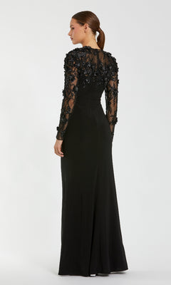 Black evening gown with long sheer sleeves on a white background