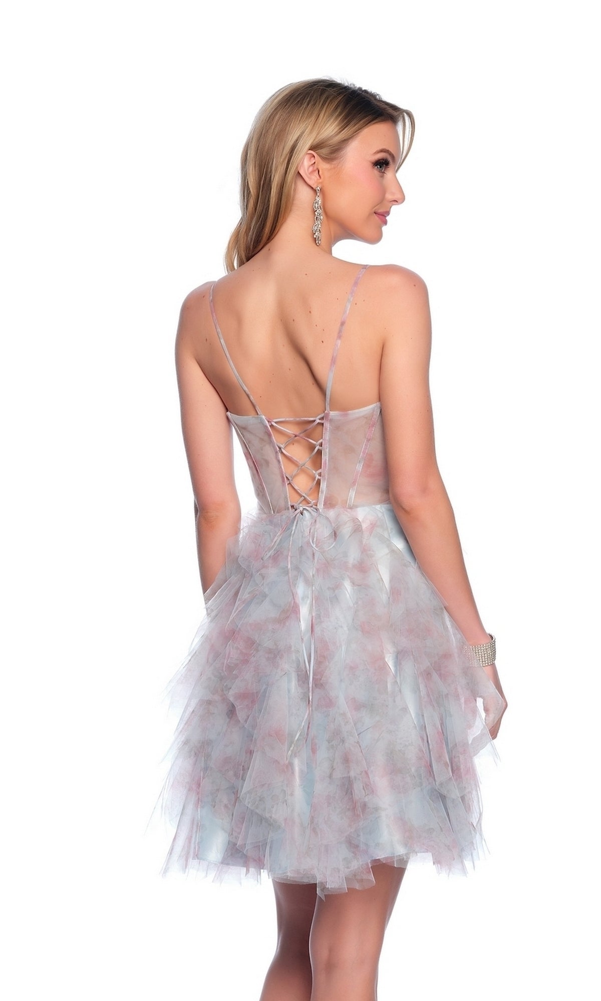 A woman stands with her back to the camera, wearing the Dave and Johnny Blue-Print Short Hoco Dress 11886—a sleeveless, pastel a-line party dress featuring a corset-style bodice and lace-up back.