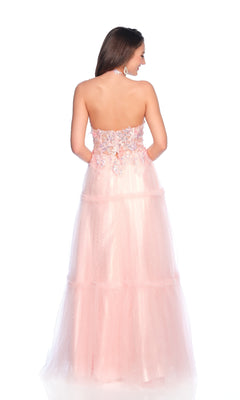 A woman stands facing away from the camera in a light pink halter prom dress (Dave & Johnny 11966) with floral bodice embellishments, floor-length skirt, and a white background.