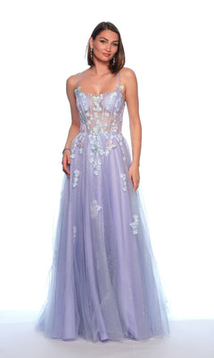 A woman in the Dave and Johnny 12015 long light purple prom dress with a sheer embroidered lace corset bodice and 3D flowers stands against a white background.