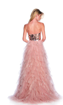 A woman with long blonde hair is seen from the back wearing the sleeveless Dave & Johnny 12037 rose pink prom dress, featuring a tiered tulle skirt and silver sparkles, against a white background.