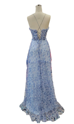 Back view of the Dave and Johnny 12077 blue floral prom dress with an A-line skirt, ruffled hem, and crisscross lace-up open back, shown on a dress form.