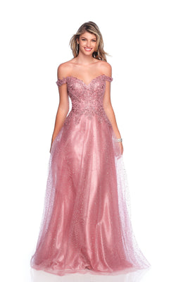 A woman smiles against a white background, wearing the Dave & Johnny 12084 Mauve Pink Prom Dress with an off-the-shoulder design, glitter tulle skirt, and intricate embellishments.