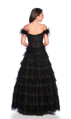 A woman faces away in the Sparkly Black Prom Ball Gown: Dave & Johnny 12129, featuring glittery details and feather straps, set against a plain white background.