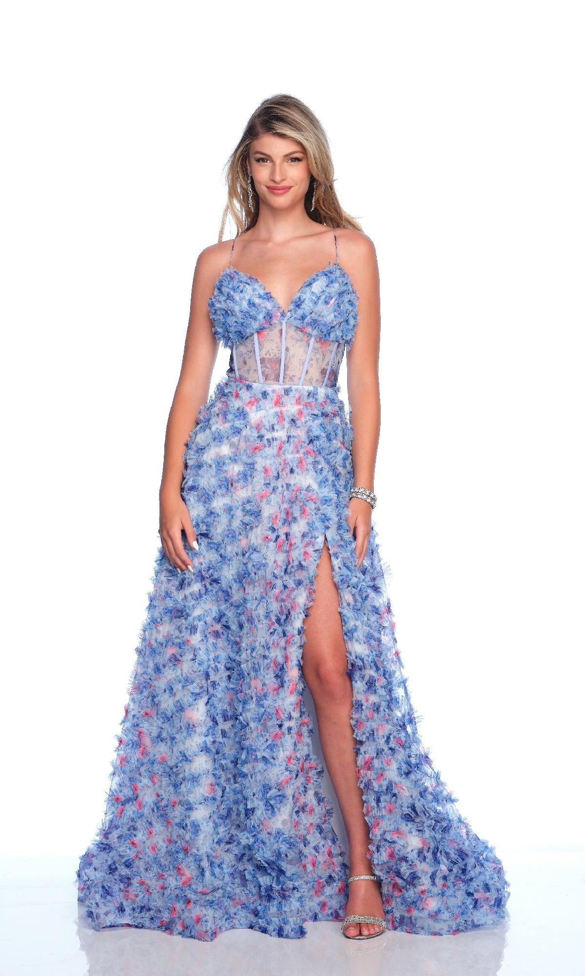 Woman wearing the Mini-Ruffle Print Prom Dress: Dave & Johnny 12140, featuring an a-line skirt, spaghetti straps, sheer bodice, and high slit, standing against a white background.
