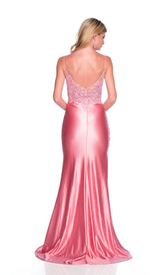 A woman faces away, wearing the Dave and Johnny 12200 long prom dress featuring a pastel pink satin floor-length skirt and a sheer corset bodice with delicate embroidery.