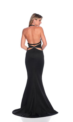 A woman poses against a plain white background wearing the Dave & Johnny 12233 Cut-Out Black Prom Dress, featuring a fitted, floor-length silhouette with halter straps and a dramatic backless design.
