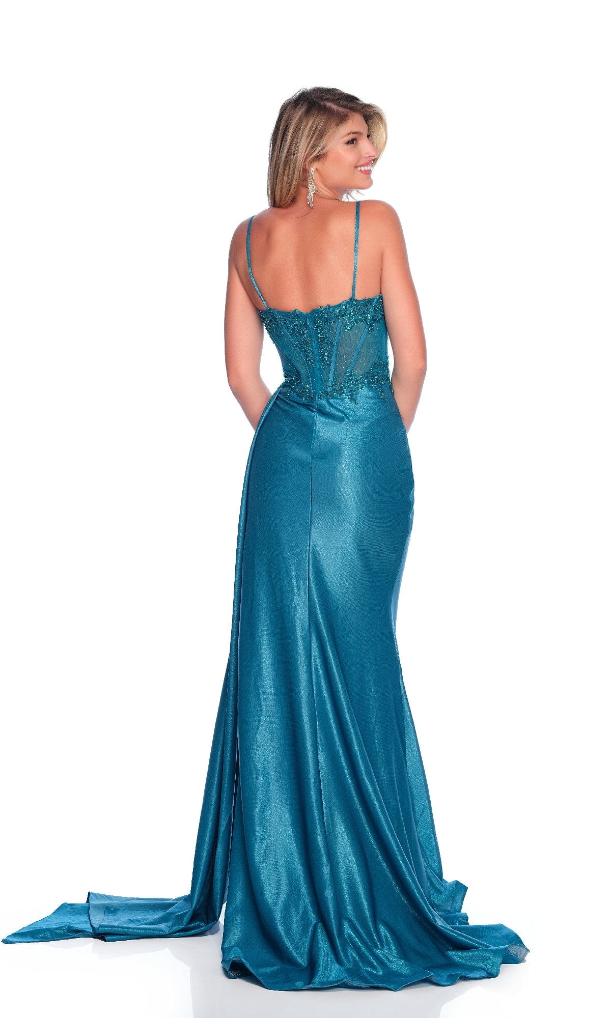 A woman models the Long Teal Prom Dress: Dave & Johnny 12247, showcasing its fitted, floor-length silhouette with thin straps, embellished corset bodice, and slight train, viewed from the back against a white background.