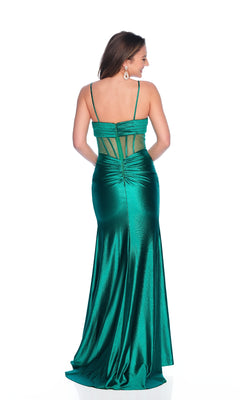 A woman stands facing away, showcasing the elegant back of the Sheer-Bodice Green Prom Dress: Dave & Johnny 12257, featuring a shiny fitted design with thin straps, sheer corset bodice, and mesh panel details.