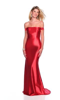 A woman stands and smiles against a plain white background, wearing the Dave & Johnny 12322 Red Long Prom Dress, featuring an off-the-shoulder satin design.