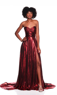 A woman wears the Dave & Johnny 12328 Metallic Prom Dress, a strapless gown with a sweetheart neckline, ruched fitted bodice, high slit, and long train, styled with silver heels and hoop earrings.
