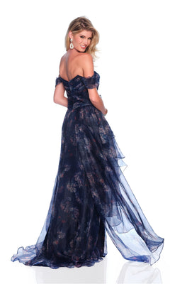 Smiling, a woman poses over her shoulder in the Dave & Johnny 12336 navy floral prom dress, set against a white background.