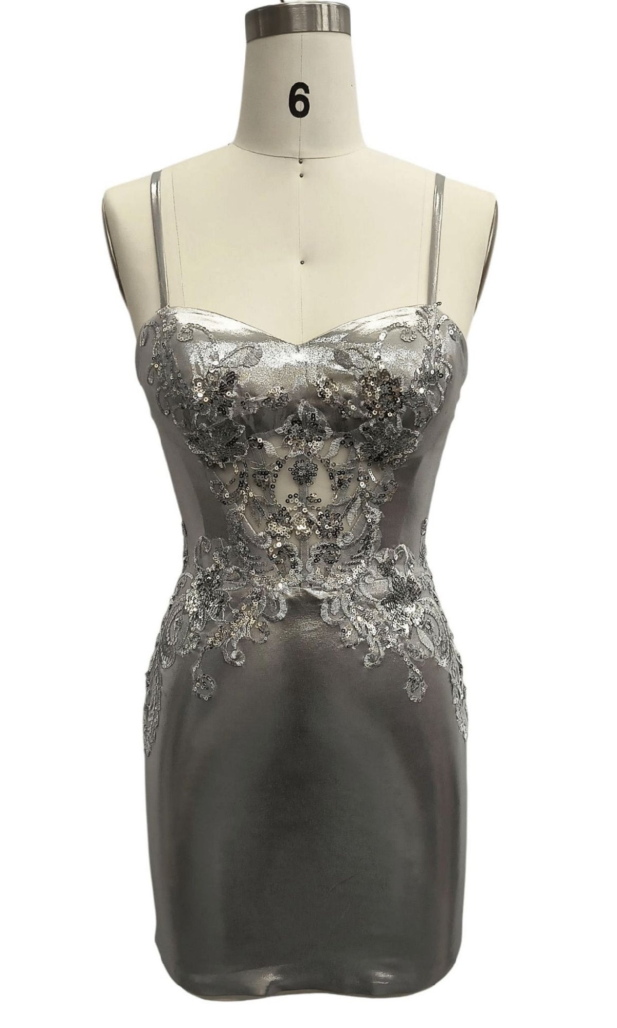 Short Silver Hoco Dress: 12394 features thin straps, floral lace appliqué on the bodice and waist, and is displayed on a dress form labeled with the number 6.