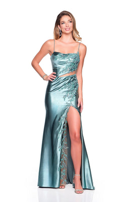 A woman smiles with one hand on her hip, wearing the Dave and Johnny 12428 long prom dress—a shiny teal satin gown featuring spaghetti straps, lace detailing, and a high slit.
