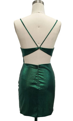 The Ruched Green Short Hoco Dress: 12441 is a metallic emerald mini with thin straps and an open back, shown from the back on a mannequin—a perfect green party dress for special occasions.
