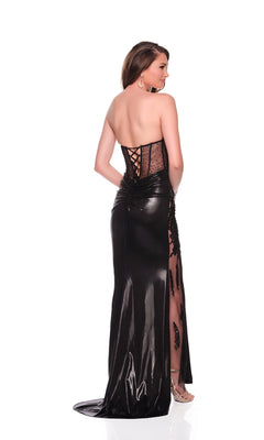 A woman faces away in the Long Prom Dress: Dave and Johnny 12586, a black strapless gown with a lace-up sheer corset bust, elegant black lace accents, and a glossy floor-length leather skirt with see-through sides.