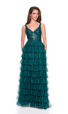A woman models the Dave and Johnny 12635 long prom dress, featuring a sleeveless embroidered bodice and tiered tulle skirt, posed against a plain white background.