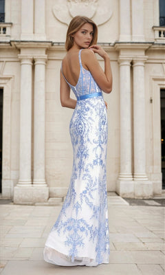 A woman stands outdoors before a classical building, wearing the Blue Embroidered Long White Corset Prom Dress L758, looking over her shoulder.