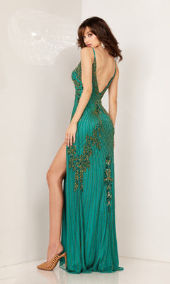 A woman showcases the Aleta Long Formal Prom Dress 1275—a sleeveless green gown with gold embellishments, featuring a high side slit and low back as she stands with her back to the camera.