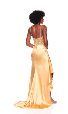 A woman faces away from the camera in the Dave and Johnny 12807 long prom dress, featuring a satin skirt, thin straps, lace-detailed corset bodice, and a train.