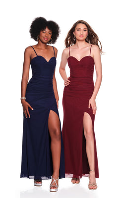 Two women stand side by side against a white background wearing Dave and Johnny 12849 long prom dresses—floor-length, ruched mesh with thigh-high slits and sweetheart necklines—one in navy blue and the other in burgundy.
