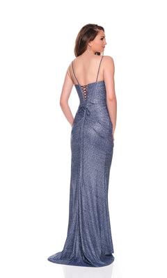 Woman in the Dave and Johnny 12879 long prom dress, a metallic blue fitted gown with spaghetti straps and lace-up back, standing against a white background.