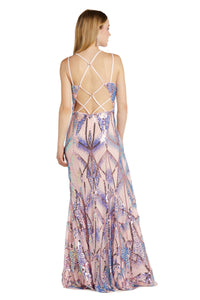 A woman stands facing away in the Morgan 12998 Art-Deco Sequin Prom Dress, a floor-length, sleeveless pink gown with purple and blue art deco patterns and a strappy open back.