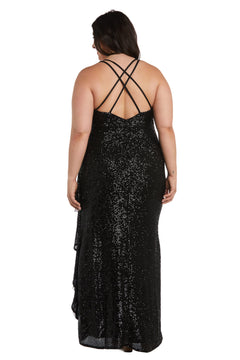A woman wearing the Long Plus-Size Sequin Prom Dress: Morgan 13029WM, featuring a black floor-length design with crisscross straps and an empire waistline, stands facing away from the camera.
