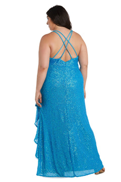 A woman, shown from the back, models the Morgan 13029WM: a sleeveless, floor-length blue plus-size sequin prom dress with an empire waist and crisscross straps.