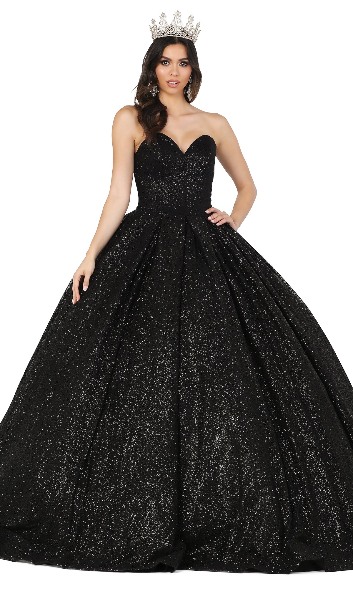 Woman wearing the Quinceanera Dress 1341 by Dancing Queen, a strapless black glitter ball gown with a sweetheart neckline and jeweled crown, standing against a white background.