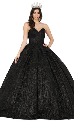 Woman wearing the Quinceanera Dress 1341 by Dancing Queen, a strapless black glitter ball gown with a sweetheart neckline and jeweled crown, standing against a white background.