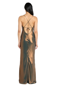 A woman wearing the Morgan 14010 Cowl-Neck Long Satin Formal Dress in metallic bronze, featuring an open back with crisscross straps, stands facing away.