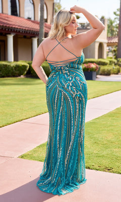 A woman in the Primavera 14101 long plus-size prom dress, featuring a blue fitted design with a strappy lace-up back.