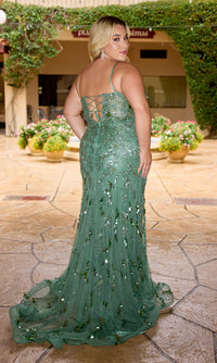 A woman in the Primavera 14106 Long Plus-Size Prom Dress, a green floor-length sequin gown with lace-up back detail, stands on a patio facing away from the camera.