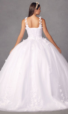 Wearing the Juliet 1437W Traditional White Quinceañera Dress with a lace-up back, floral details, and ball gown silhouette, a woman stands against a neutral gray background facing away from the camera.
