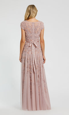 A woman with blonde hair is seen from behind wearing a floor-length, short-sleeved sky blue Mac Duggal 14521 formal dress.