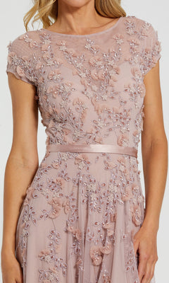 Woman wearing a long, sky blue Mac Duggal 14521 formal dress.