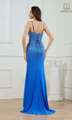 A woman models the Lucci Lu 1453 Long Prom Dress—a sleeveless, floor-length blue gown adorned with shimmering hot-stone embellishments—posing with her back to the camera in a white room featuring elegant columns.